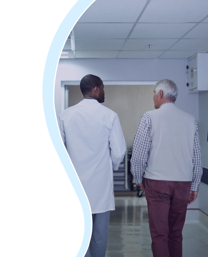 Patient and Doctor walking in a hospital corridor